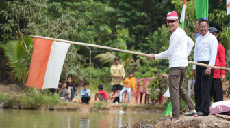 Pj Bupati Muaro Jambi, Bachyuni Deliansyah Lepas Lomba Perahu di Desa Tangkit
