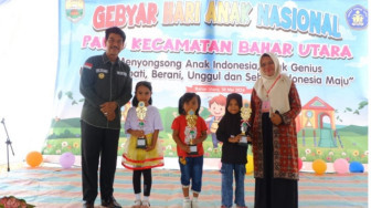 Pj Bupati Muaro Jambi Buka Gebyar Hari Anak Nasional PAUD Kecamatan Bahar Utara