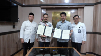 Penandatanganan Kesepakatan Bersama Pemda Muaro Jambi Dengan Universitas Muhammadiyah Jambi