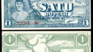 Ilustrasi: Uang kertas kuno bernilai satu rupiah Republik Indonesia tampak depan dan belakang.