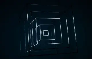 Ilustrasi: Instalasi seni berbentuk kubus geometris dengan garis cahaya neon di ruangan gelap.