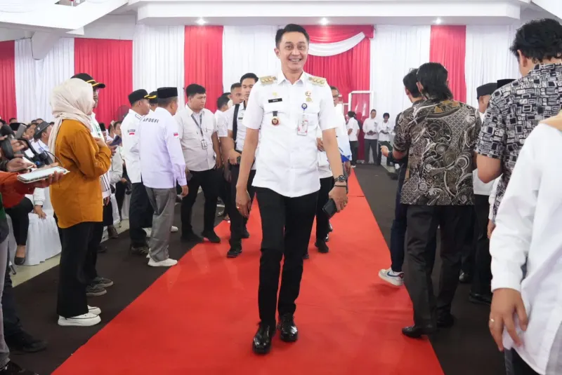Pj Bupati Muaro Jambi, Bachyuni Deliansyah menghadiri Rakernas APDESI di Unja || Foto : KMJ